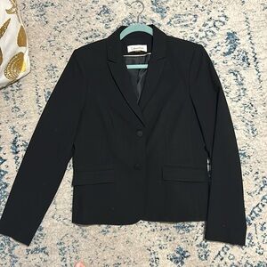Calvin Klein black women’s blazer size 10. Lined, fitted